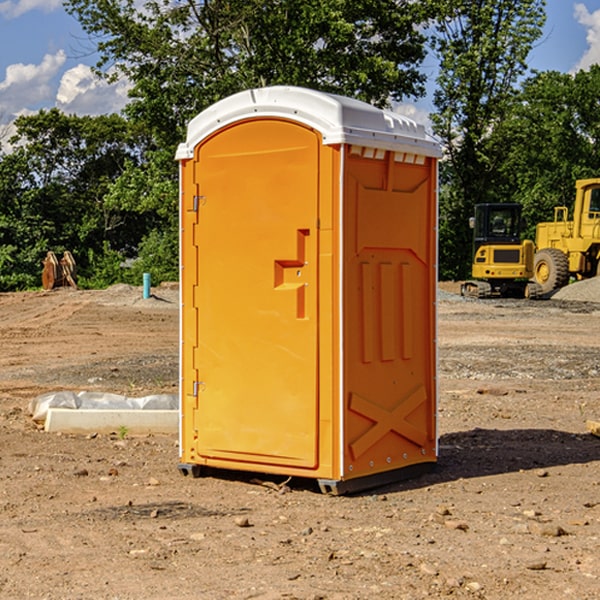 how often are the portable toilets cleaned and serviced during a rental period in Seville